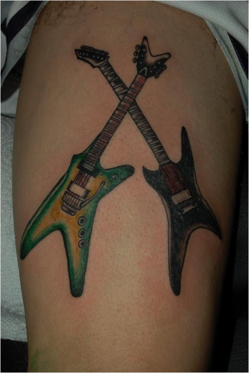 My friends tattoos Guitars